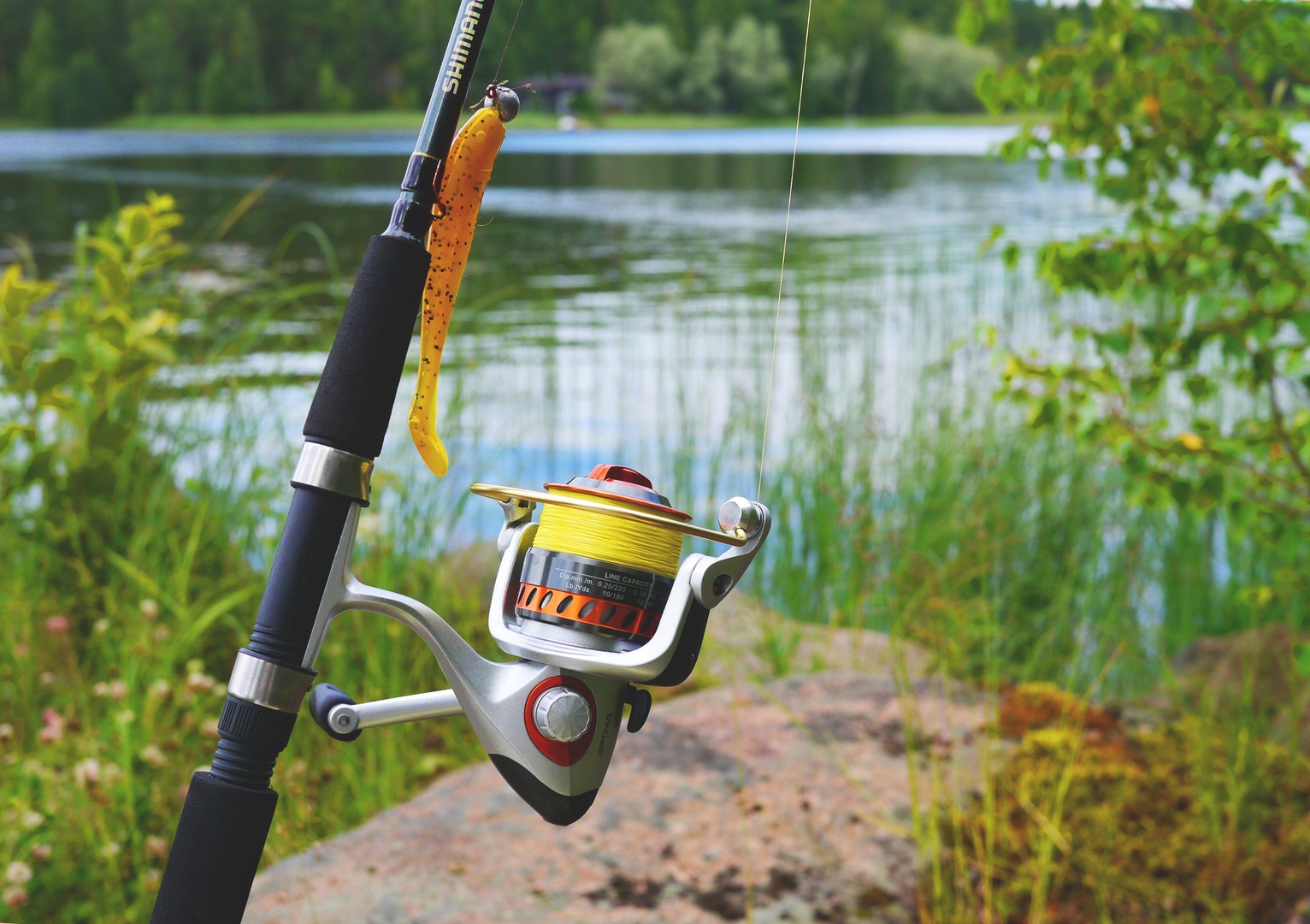 Angler relaxing while fishing with braided line
