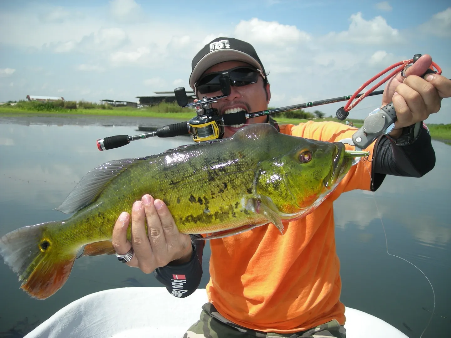 Angler choosing fishing line based on water conditions and target species