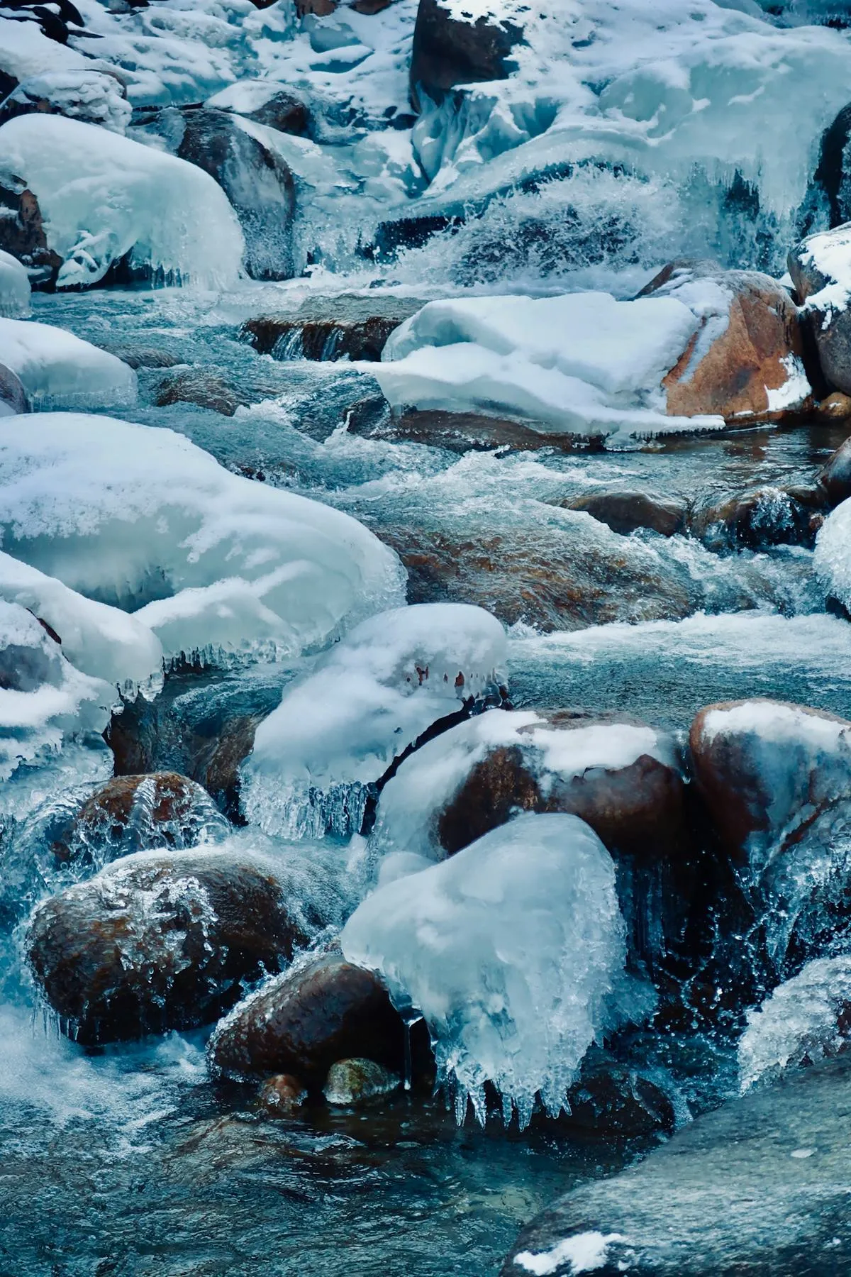 icy river winter fishing — photo from Pexels